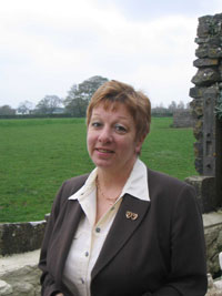 Councillor Cheryl Green, Bridgend, standing outdoors