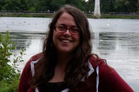 Councillor Emma Sandrey, Cardiff, standing in front of a lake