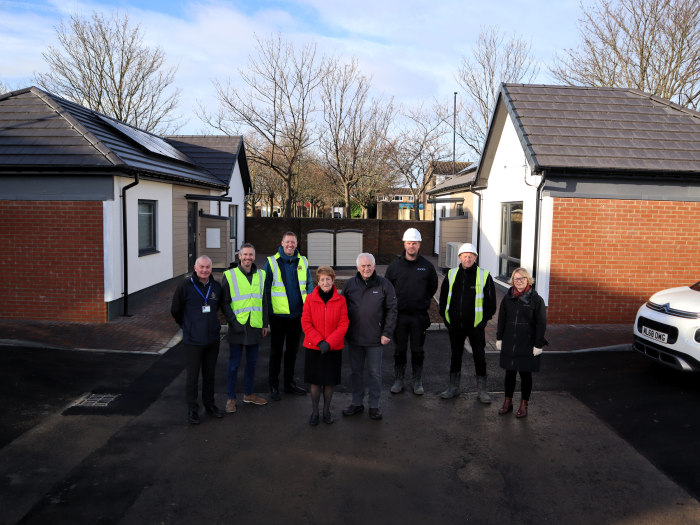 HUSK Wallsend team standing outside in front of completed garage-to-home conversions