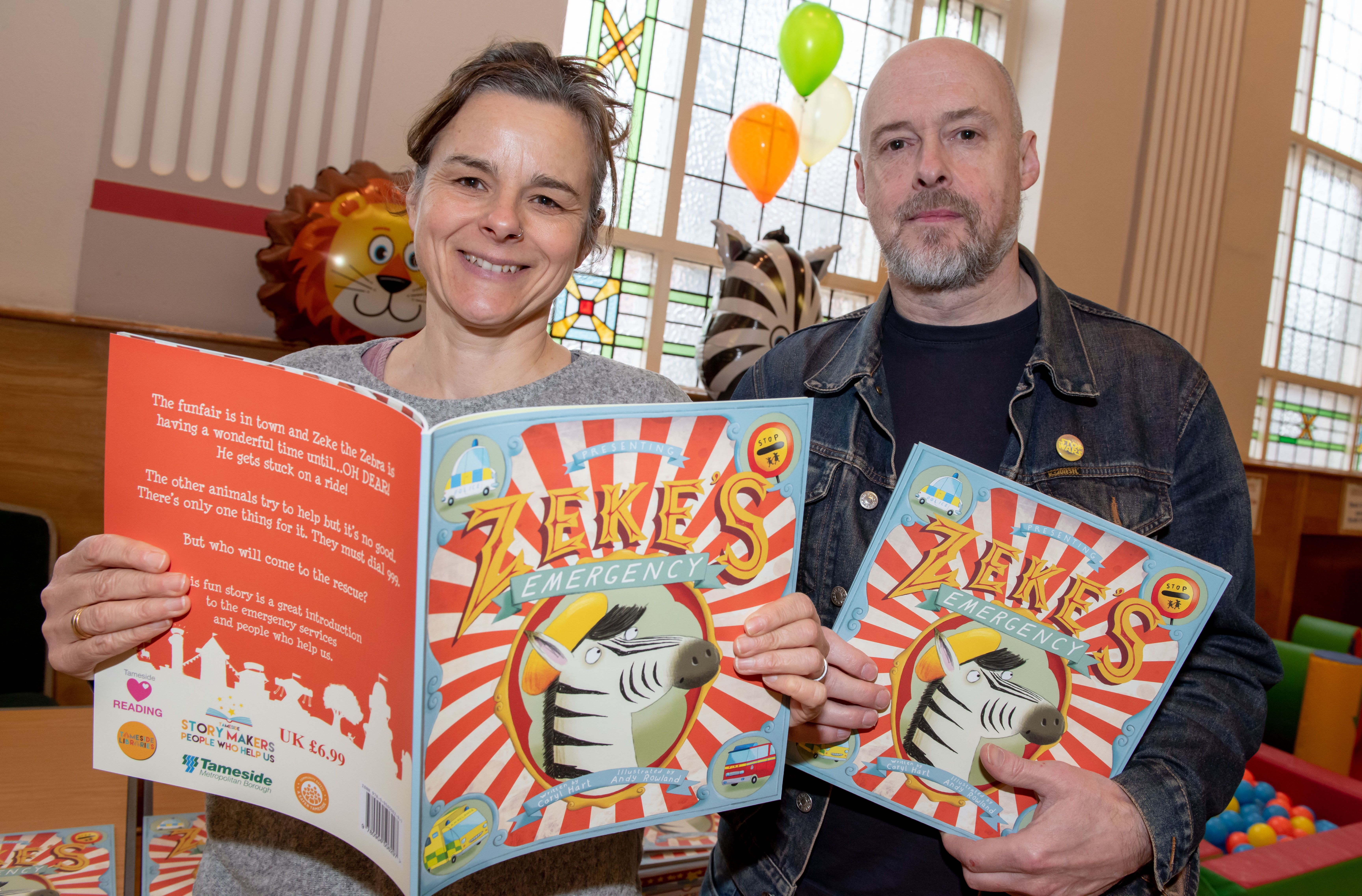 Two adults holding two colourful books