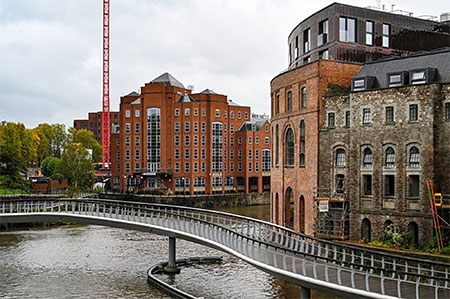 A river in Bristol City with a bridge across it