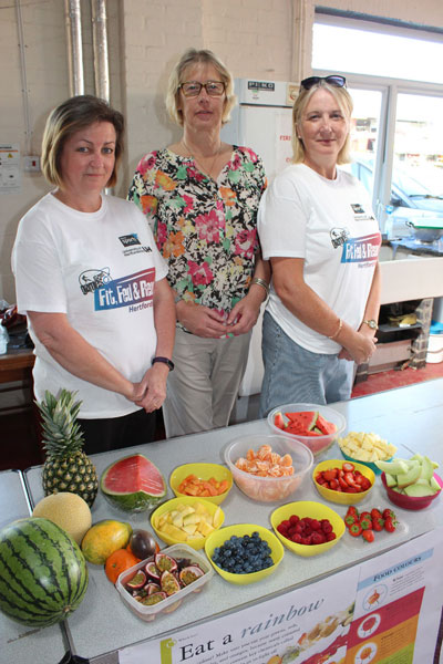 Three chefs from Hertfordshire County Council present a healthy meal  
