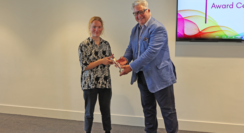 Faith Scott Deuchar and Cllr Kevin Bentley. Kevin is handing over Faith her award trophy.