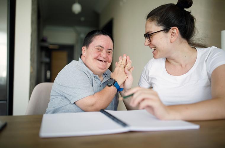 Carer supporting person