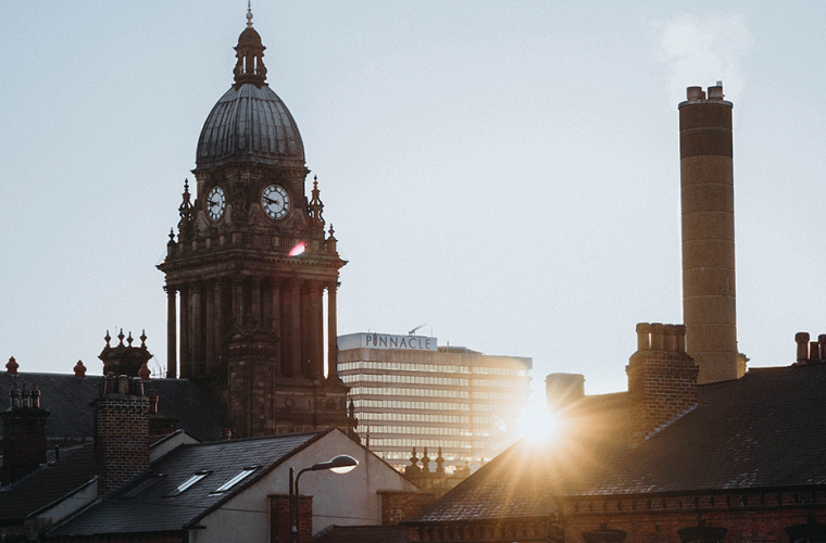 buildings at Leeds Town hall shining at sunset