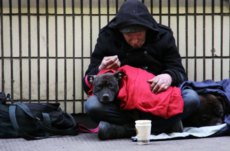 Male rough sleeper with his dog