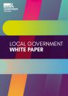 A deep purple fading in turquoise background with two light green and blue bar lines going horizontal. With a pink and orange colourful bar going vertical and light blue and a yellow green bar going horizontal. Text across reads Local Government White Paper