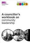 Councillor work book on community leadership cover showing people talking around a table in an office
