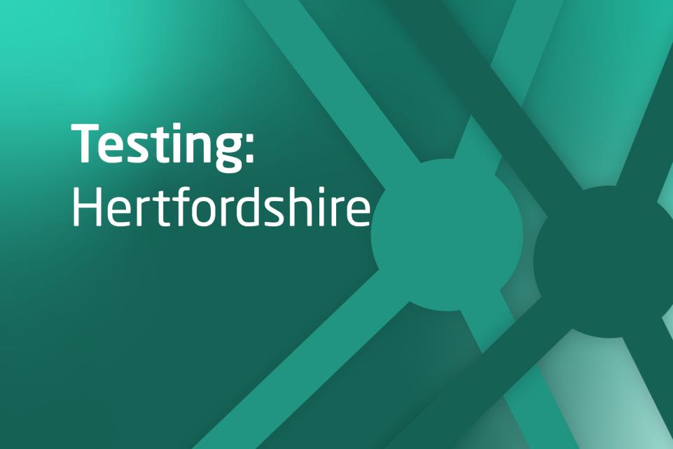 Dark green graphic with text display Testing in Hertfordshire 