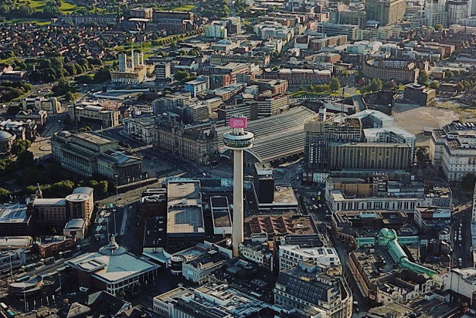 Ariel shot of Liverpool city centre showing a mix of high rise buildings and housing
